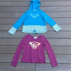 KIDS ROXY blue sweatshirt and pink shirt.